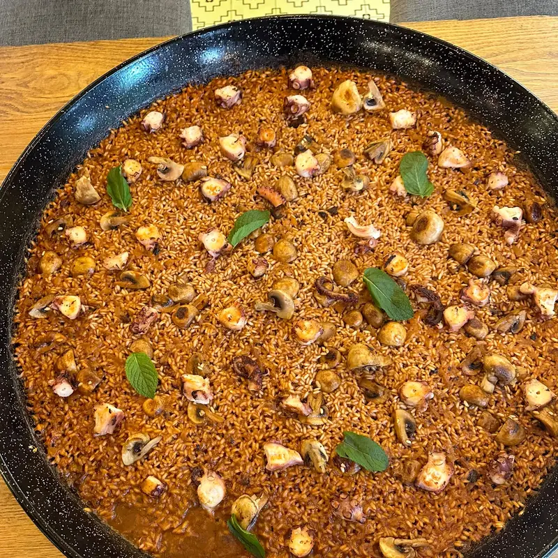Octopus rice seen from above with fresh mint