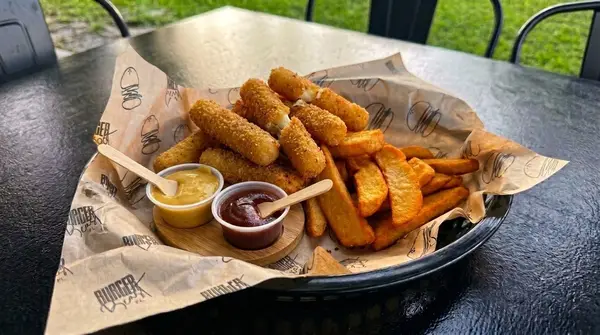 Mozzarella sticks with fries and two sauces